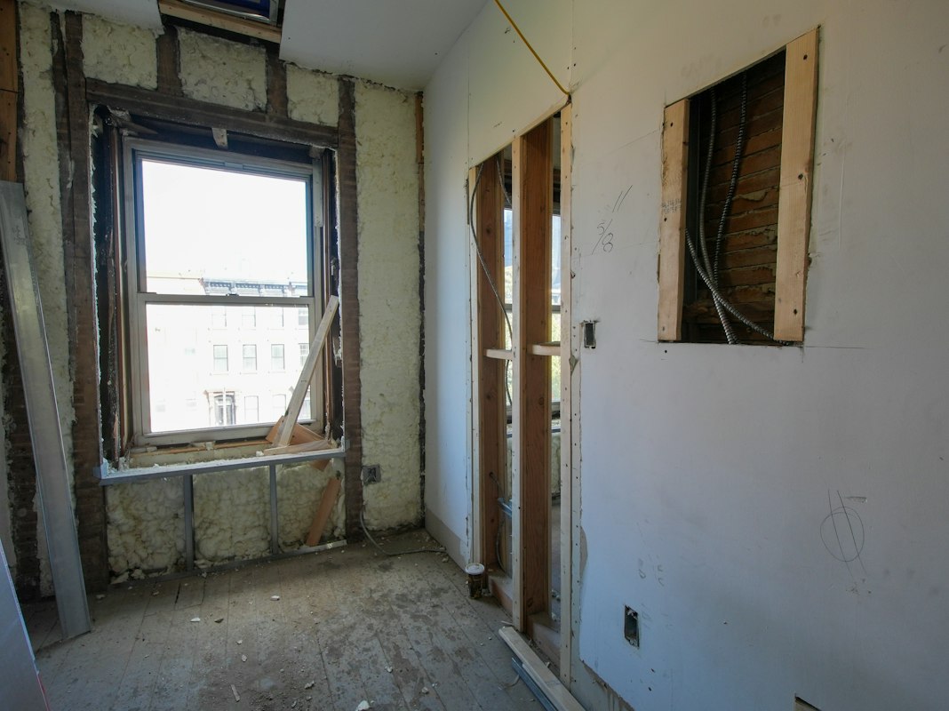 Multi-family residential complex construction with coordinated planning and safety protocols